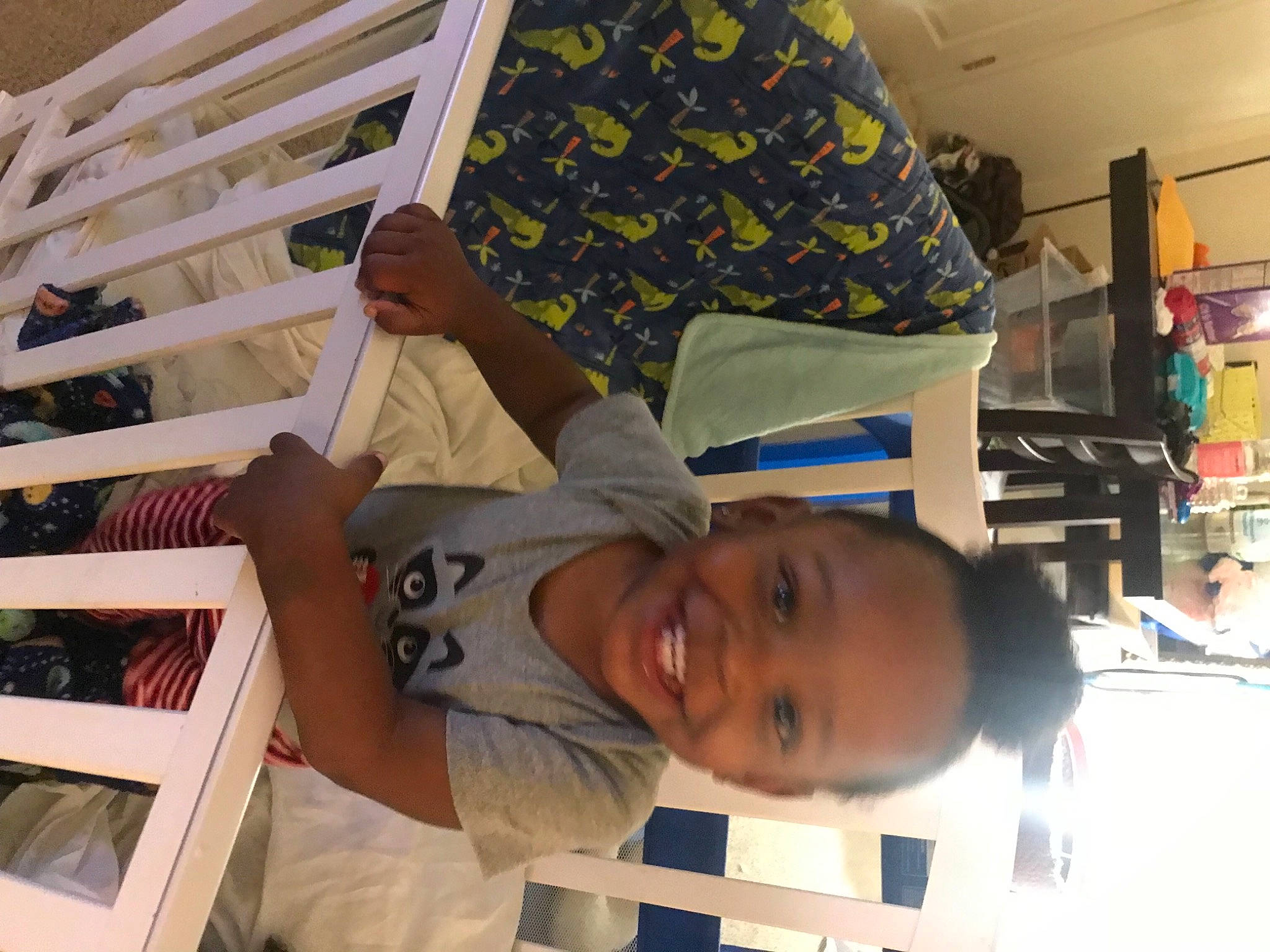 Kartier is registered to the contest to win money with this photo: child, comfort, fun, happy, hardwood, hat, joy, leisure, outdoor_furniture, pattern, person, photograph, product, room, shelf, smile, snapshot, t_shirt, toddler, wood