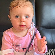 Isalya a rejoint le concours — aidez-le/la à gagner de superbes lots ! toddler, child, baby, indoor, sitting, pink_clothing, blue_eyes, pigtails, face, hand, couch, living_room, toy, curious, person, cute, expression, home, young_child, portrait