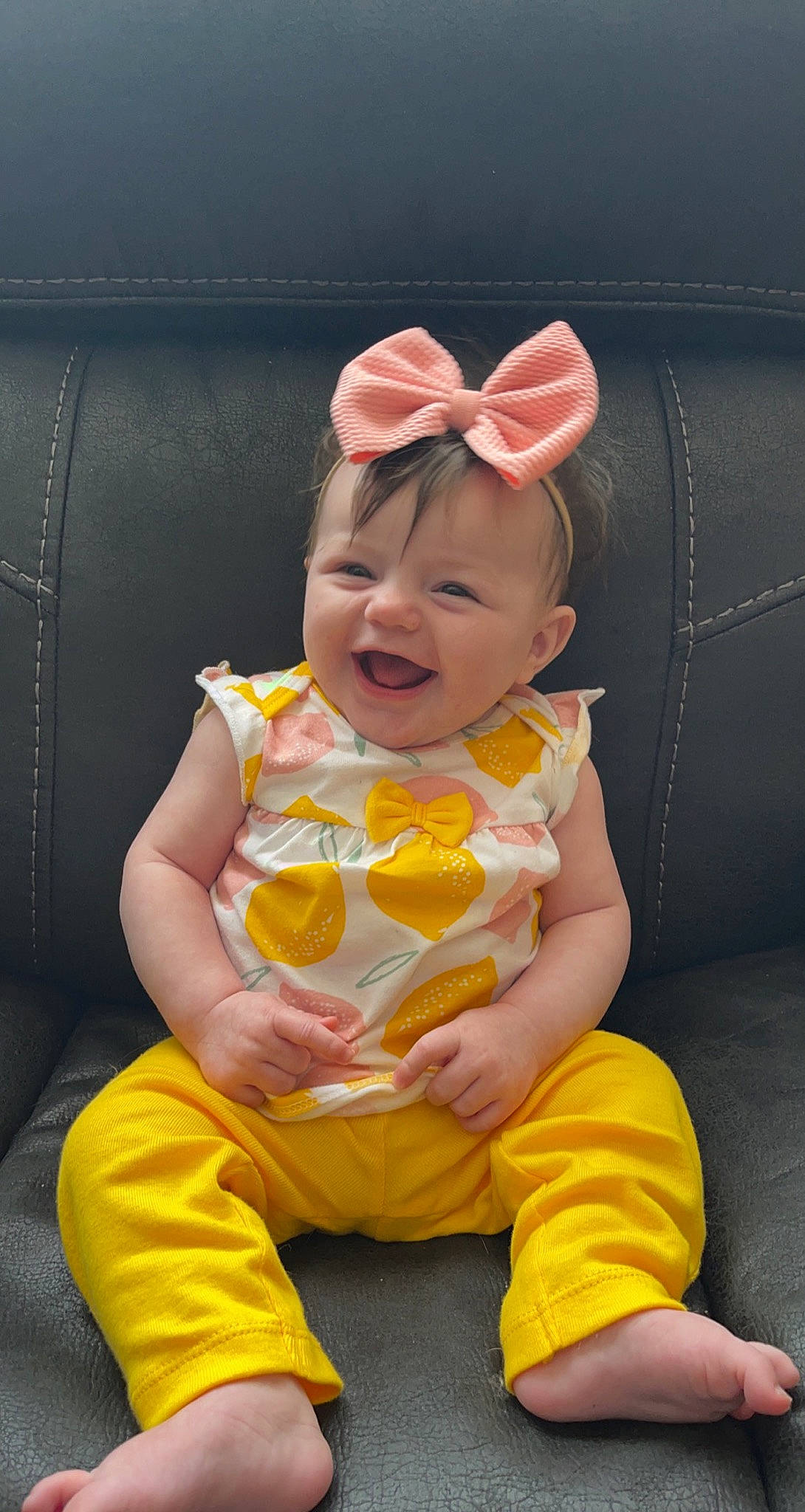 Edith is registered to the contest to win money with this photo: baby, baby_toddler_clothing, child, comfort, costume_hat, dress, eye, fashion_accessory, fun, happy, hat, head, orange, person, pink, sitting, skin, sleeve, smile, toddler