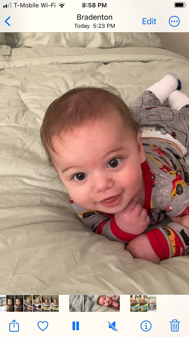 Owen is registered to the contest to win money with this photo: baby, baby_products, baby_toddler_clothing, cheek, child, comfort, flooring, fun, happy, iris, linens, pattern, person, product, sitting, skin, sleeve, smile, textile, toddler