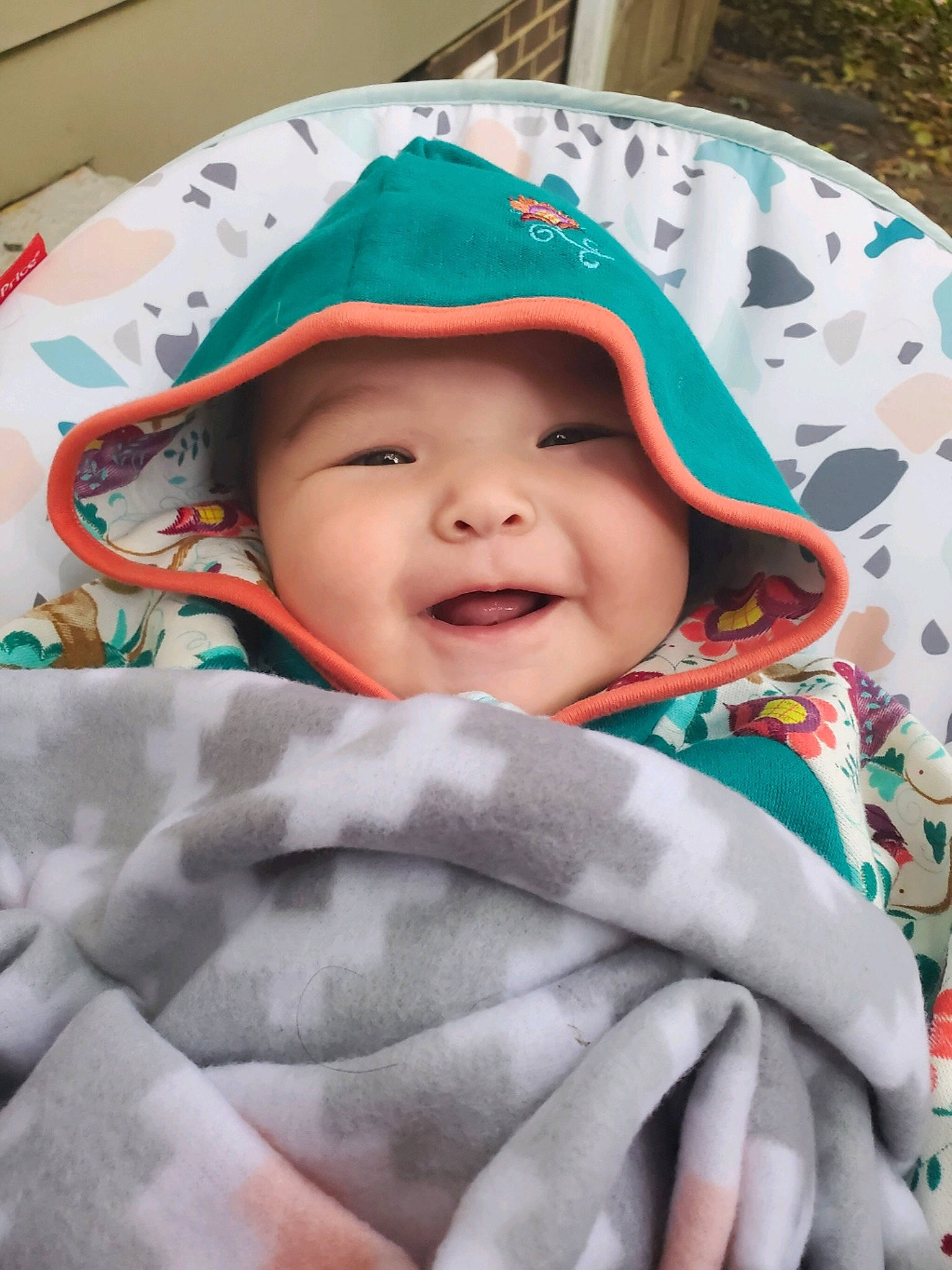 Ryatt joined the competition — help win amazing prizes! baby, cap, cheek, chin, eyebrow, face, facial_expression, finger, gesture, green, hand, happy, headwear, lip, mouth, nose, person, pink, product, skin