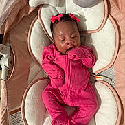 Serenity joined the competition — help win amazing prizes! baby, infant, sleeping, pink_onesie, bows, baby_bouncer, plush_toys, moon, cloud, soft_cushion, indoors, peaceful, cute, newborn, child, cozy, resting, fabric, comfort, adorable