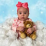 Lia is registered to the contest to win money with this photo: baby, child, infant, portrait, teddy_bear, stuffed_animal, pink_bow, headband, pink_clothing, onesie, blanket, fluffy_blanket, cloud_background, stars, indoor, sitting, cuddling, wide_eyes, adorable, studio_photography