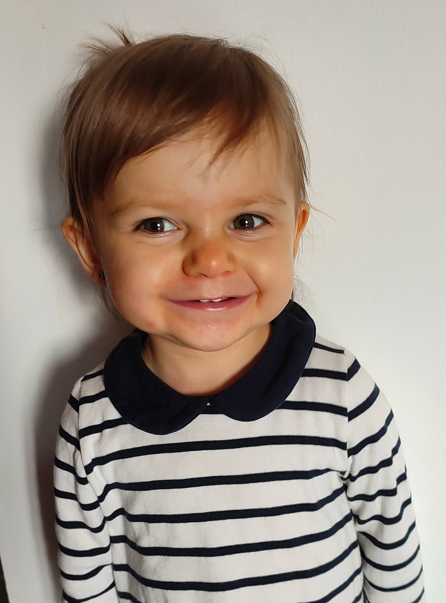 Lizzie participe au concours pour gagner de l'argent avec cette photo : baby, baby_toddler_clothing, cheek, child, child_model, clothing, collar, eyelash, flash_photography, happy, iris, joy, person, portrait, portrait_photography, sleeve, smile, t_shirt, toddler