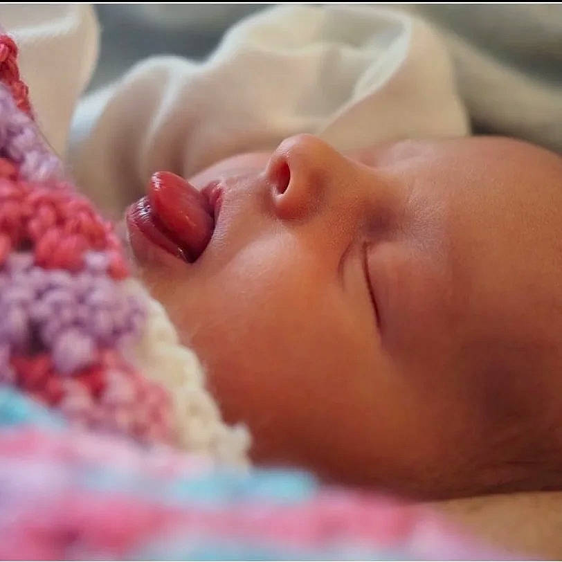 Saoirse is registered to the contest to win money with this photo: baby, baby_sleeping, baby_toddler_clothing, bedtime, cheek, child, comfort, eyelash, hand, happy, headgear, iris, linens, lip, mouth, nail, nap, nose, person, thumb