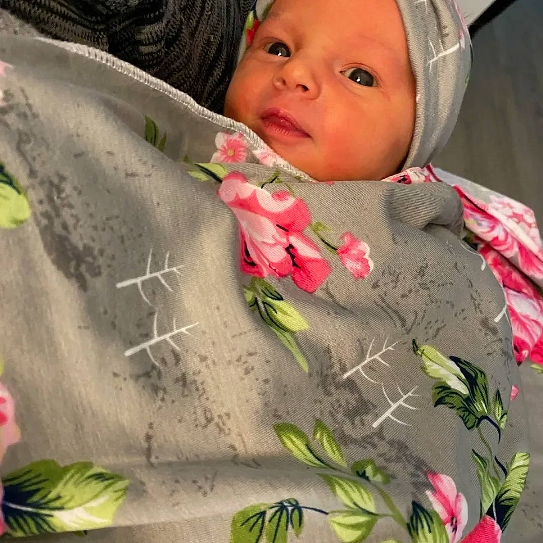 Saoirse is registered to the contest to win money with this photo: baby, beauty, child, cut_flowers, eye, floral_design, flower, flower_arranging, happy, headwear, leaf, linens, people_in_nature, person, petal, photograph, pink, plant, snapshot, spring