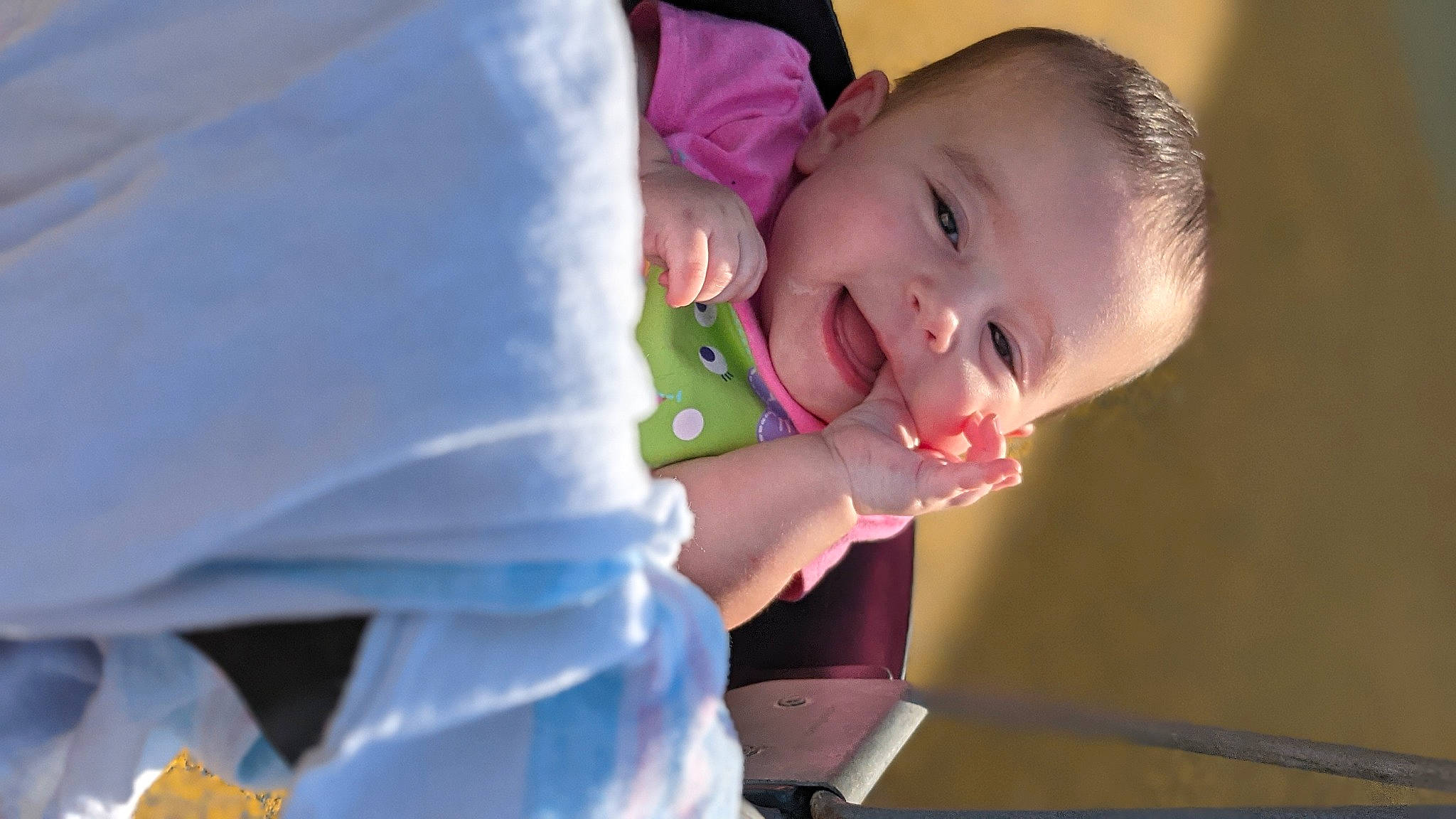 Evyanna is registered to the contest to win money with this photo: baby, baby_products, baby_toddler_clothing, cheek, dress, eye, eyebrow, eyelash, flash_photography, fun, gesture, happy, human_body, iris, lip, nose, person, sitting, sleeve, smile