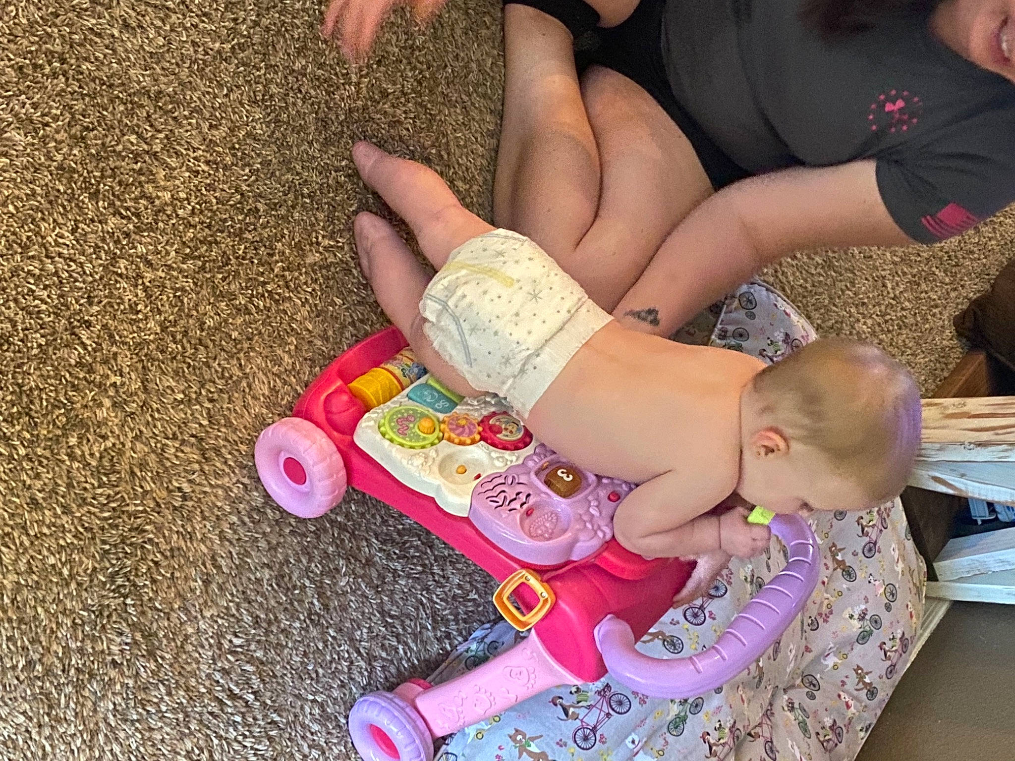 Braylynn joined the competition — help win amazing prizes! arm, baby_toddler_clothing, facial_expression, finger, foot, fun, hairstyle, happy, human_body, joint, knee, lap, leg, leisure, nail, people_in_nature, person, pink, sock, thigh