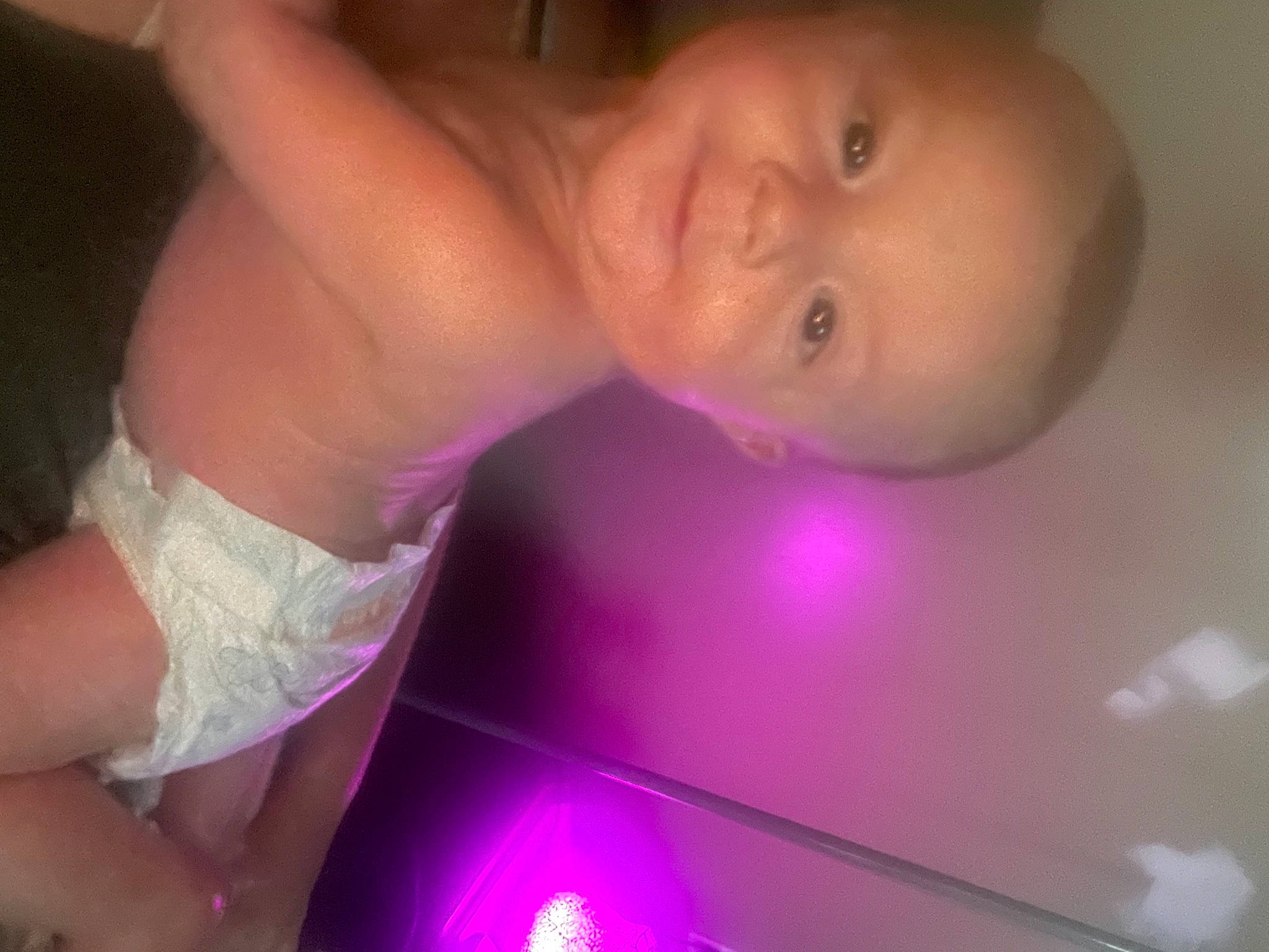 Watson is registered to the contest to win money with this photo: arm, chest, ear, elbow, eyelash, finger, gesture, hand, happy, iris, light, lip, magenta, nail, neck, person, pink, purple, thumb, trunk