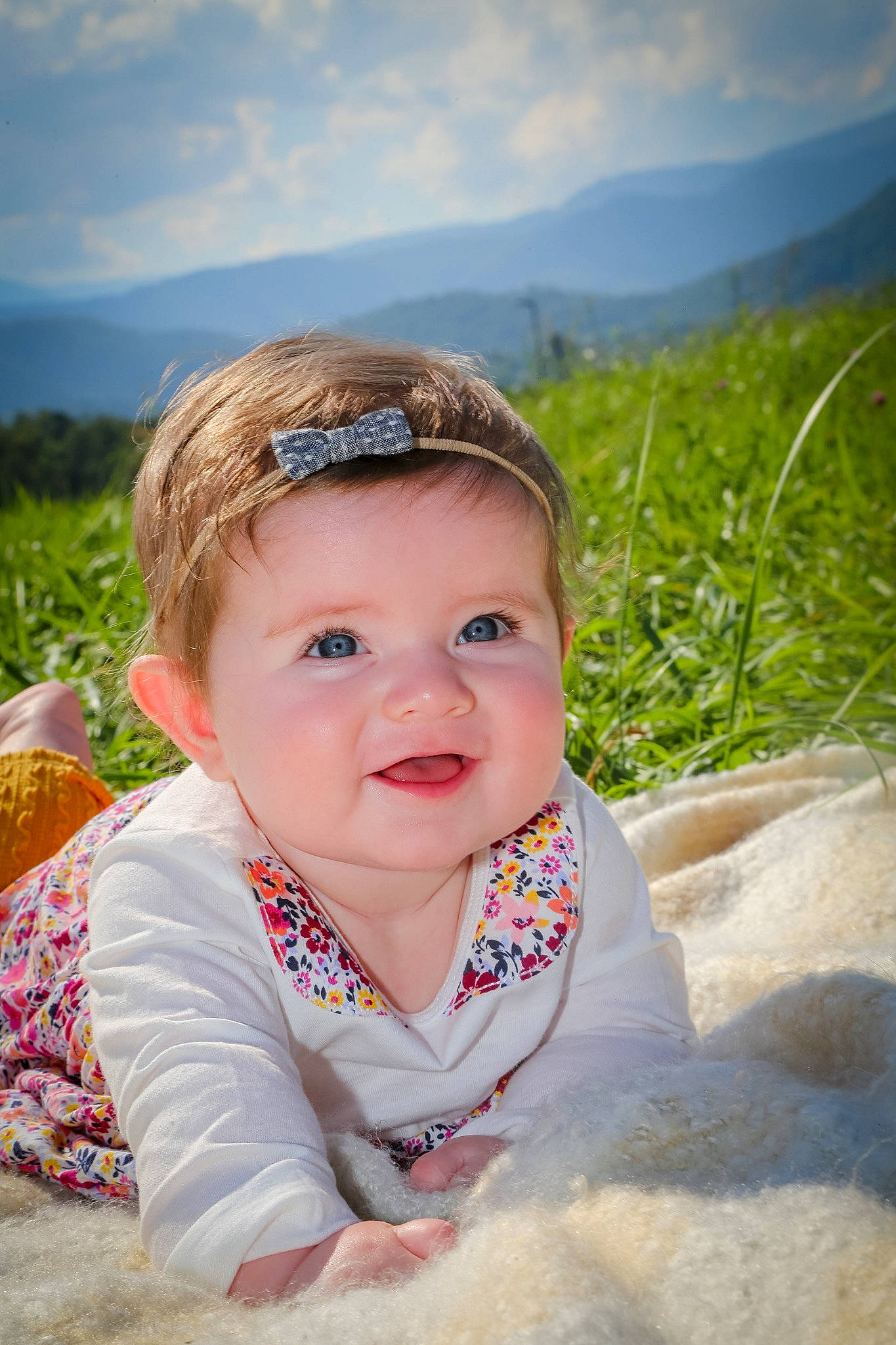Camille is registered to the contest to win money with this photo: beauty, child, eye, flower, fun, girl, grass, hair_accessory, happiness, infant, iris, person, pink, plant, portrait_photography, skin, smile, spring, summer, toddler
