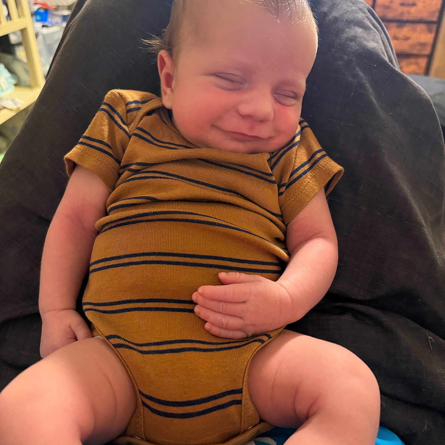 Braxton is registered to the contest to win money with this photo: baby, bodypart, clothing, computerhardware, couch, cushion, electronics, face, finger, furniture, hand, happy, head, homedecor, person, photography, portrait, sitting, smile, t_shirt