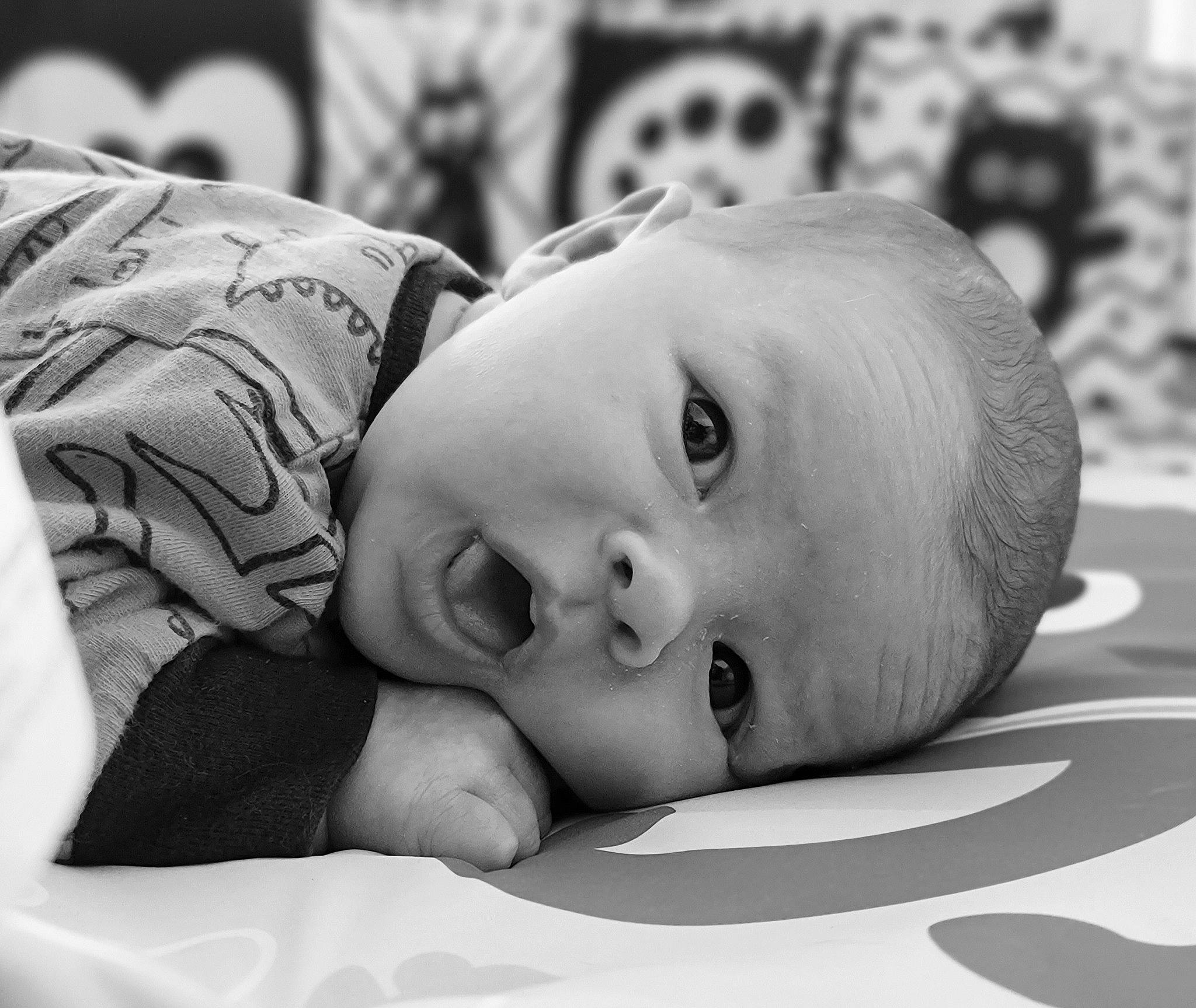 Hudson joined the competition — help win amazing prizes! baby, black_and_white, cheek, child, chin, comfort, eye, eyebrow, eyelash, face, flash_photography, happy, head, iris, mammal, monochrome, monochrome_photography, person, room, toddler