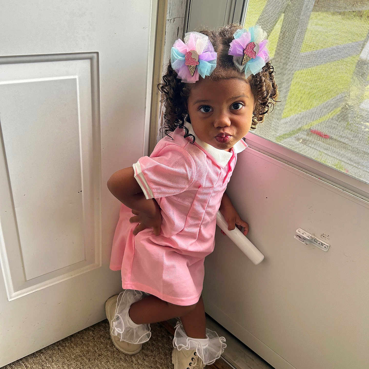 Sariyah joined the competition — help win amazing prizes! child, clothing, door, dress, face, female, footwear, girl, hair, hardwood, head, person, photography, portrait, shoe, sitting, sleeve, window, windowsill, wood