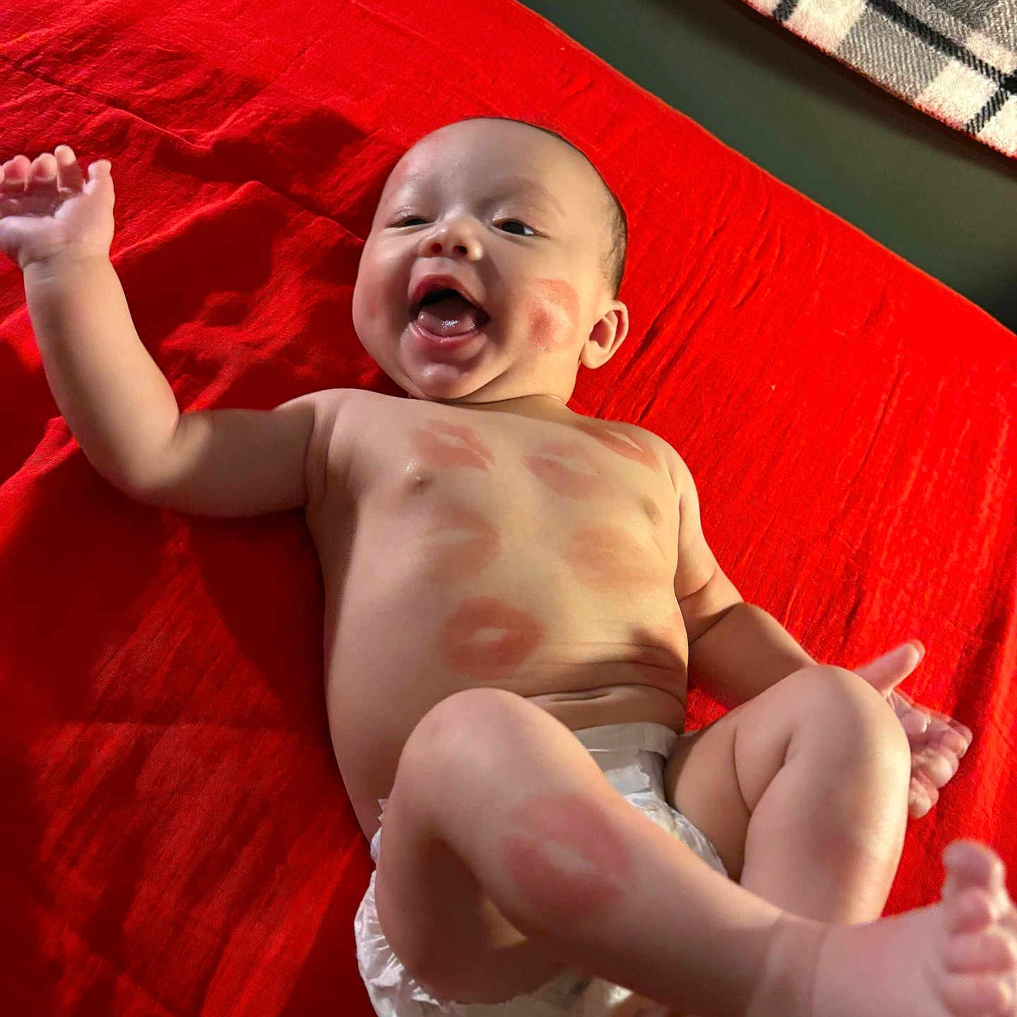 Theo is registered to the contest to win money with this photo: baby, babylaughing, bed, bedroom, clothing, crying, diaper, face, furniture, happy, head, indoors, laughing, newborn, person, photography, portrait, quilt, room, sad