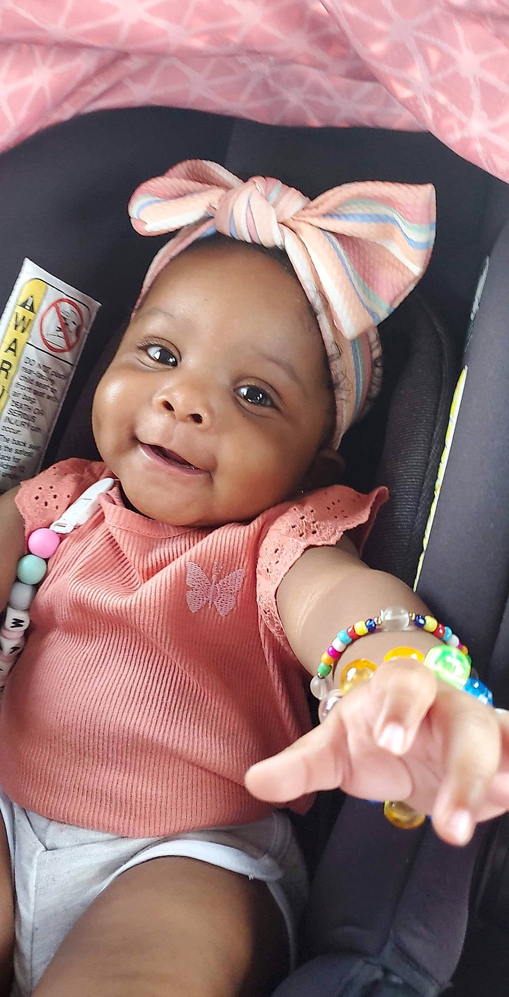 Malani joined the competition — help win amazing prizes! baby, baby_toddler_clothing, cheek, chin, eye, eyelash, hand, headwear, human, human_body, iris, lip, mouth, nose, organ, person, pink, product, skin, sleeve