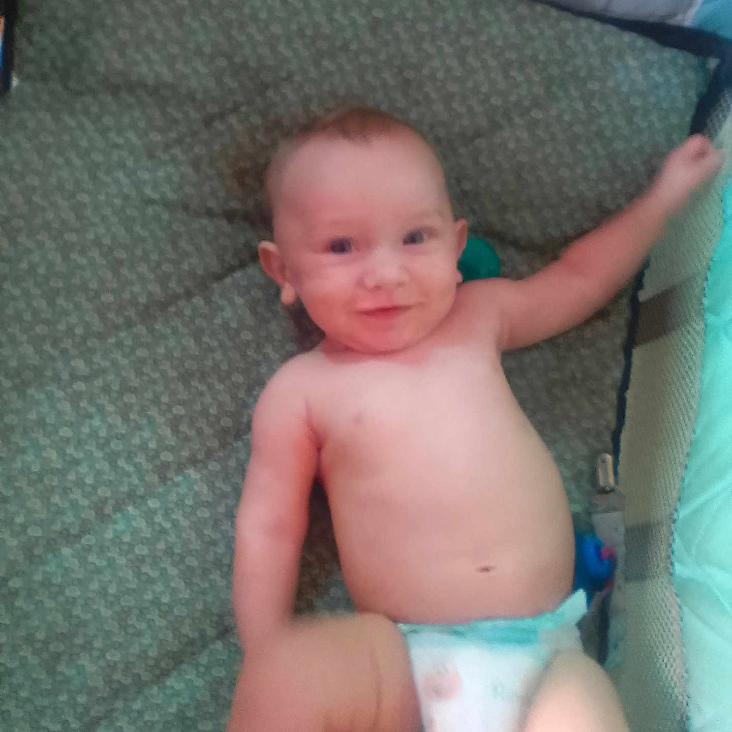 Dean Mukenschnabl joined the competition — help win amazing prizes! baby, diaper, playpen, mat, child, smile, arm, pattern, indoor, infant, cute, skin, happy, lying, person, young, one_person, head, face, baby_toy