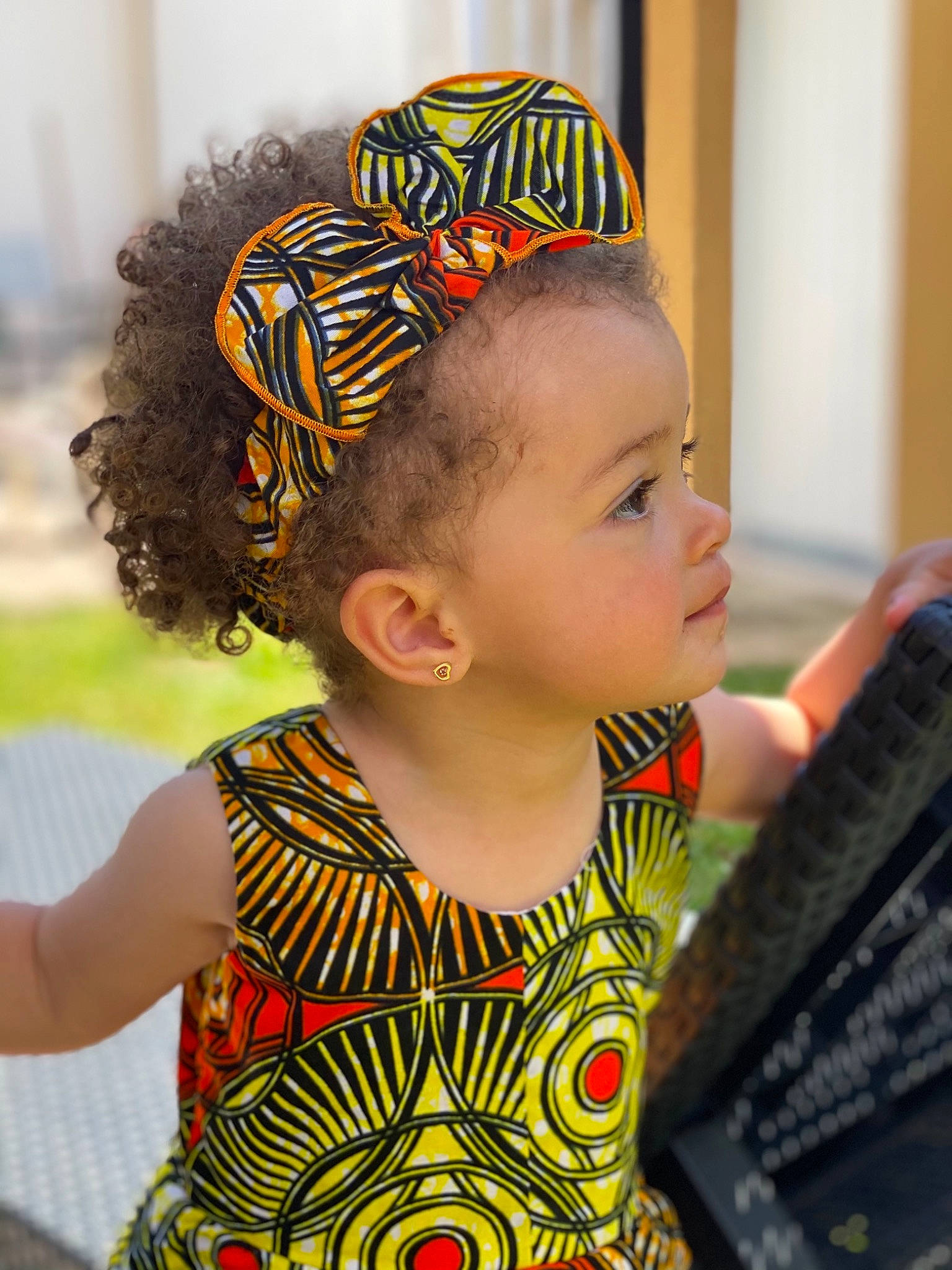 Victoria participe au concours pour gagner de l'argent avec cette photo : baby, baby_toddler_clothing, beauty, cap, child, design, ear, fashion_accessory, fun, hairstyle, happy, headband, headpiece, neck, orange, pattern, person, sleeve, t_shirt, toddler