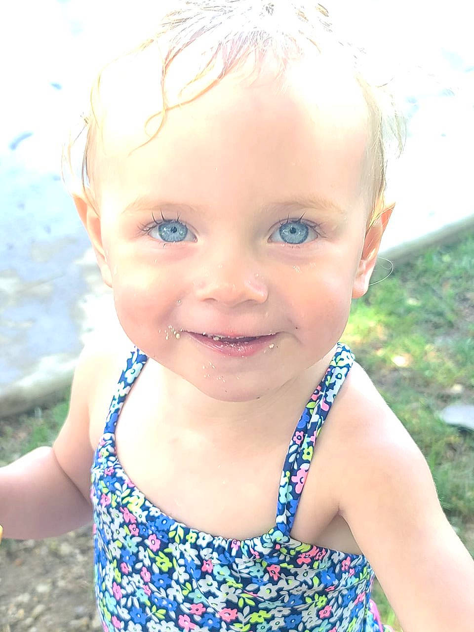 Braelynne is registered to the contest to win money with this photo: aqua, azure, baby_toddler_clothing, beauty, child, cool, electric_blue, eye, grass, happy, iris, joy, leisure, lip, people_in_nature, person, skin, smile, summer, sunlight