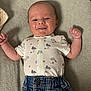 Eden a rejoint le concours — aidez-le/la à gagner de superbes lots ! baby, infant, smiling, clothing, jeans, shirt, animal_print, raised_hands, lying_down, happy, cute, face, skin, small_fists, fabric, texture, indoor, soft_surface, casual, child