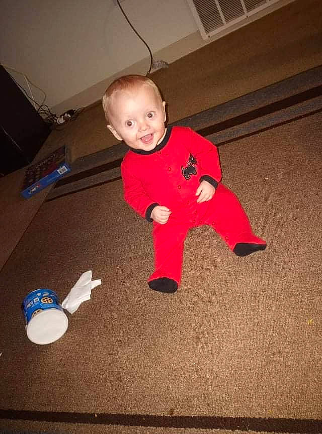 Charles is registered to the contest to win money with this photo: audio_equipment, baby, baby_toddler_clothing, carmine, child, crawling, finger, flash_photography, floor, flooring, fun, gadget, happy, hardwood, person, play, sleeve, t_shirt, toddler, toy