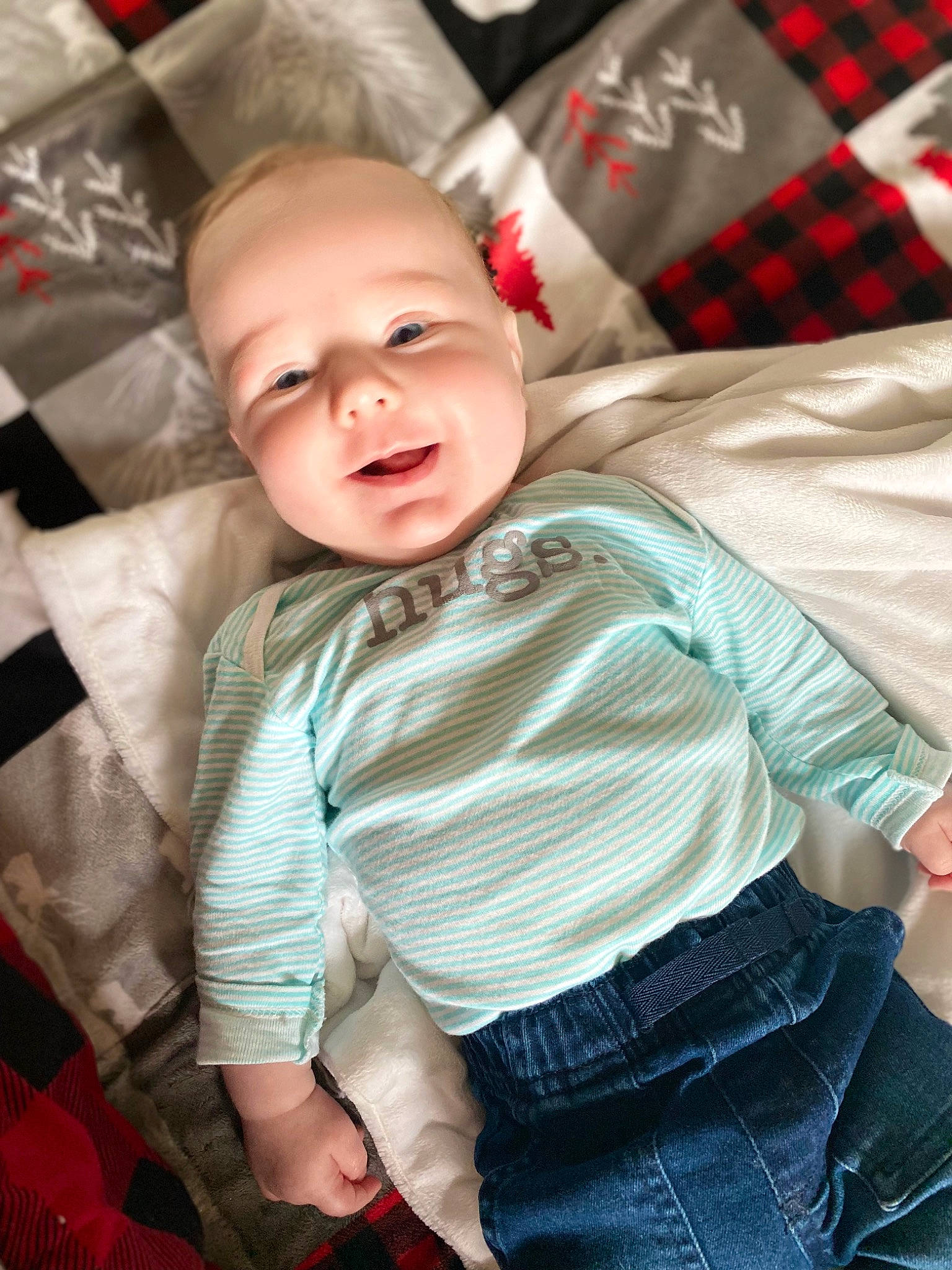 Korben joined the competition — help win amazing prizes! baby, baby_products, baby_toddler_clothing, child, comfort, couch, design, happy, linens, pattern, person, plaid, room, sitting, sleeve, smile, t_shirt, tartan, textile, toddler