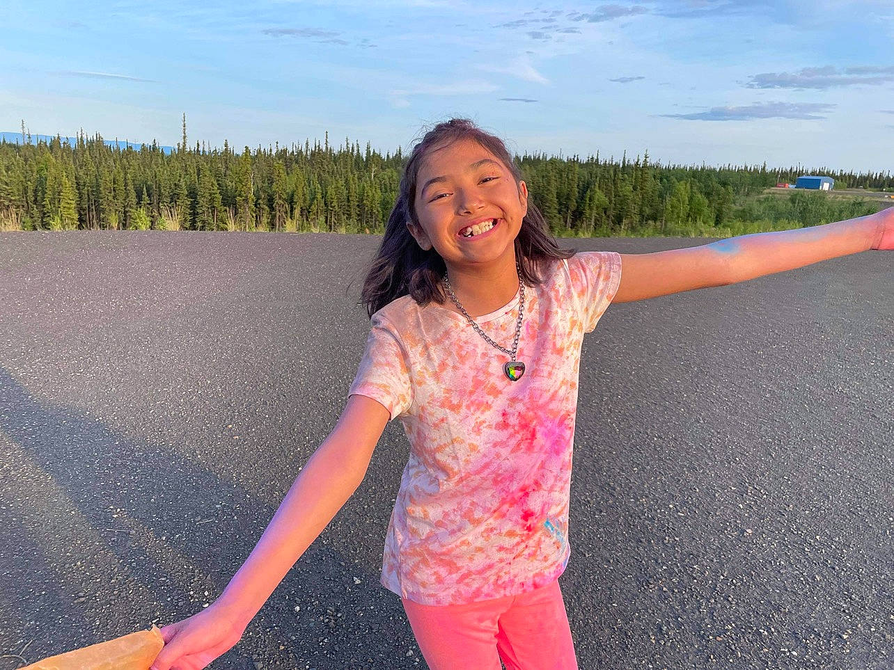 Hadassah is registered to the contest to win money with this photo: cloud, flash_photography, fun, gesture, grass, grass_family, grassland, happy, horizon, joy, landscape, leisure, long_hair, meadow, people_in_nature, person, sky, smile, summer, t_shirt