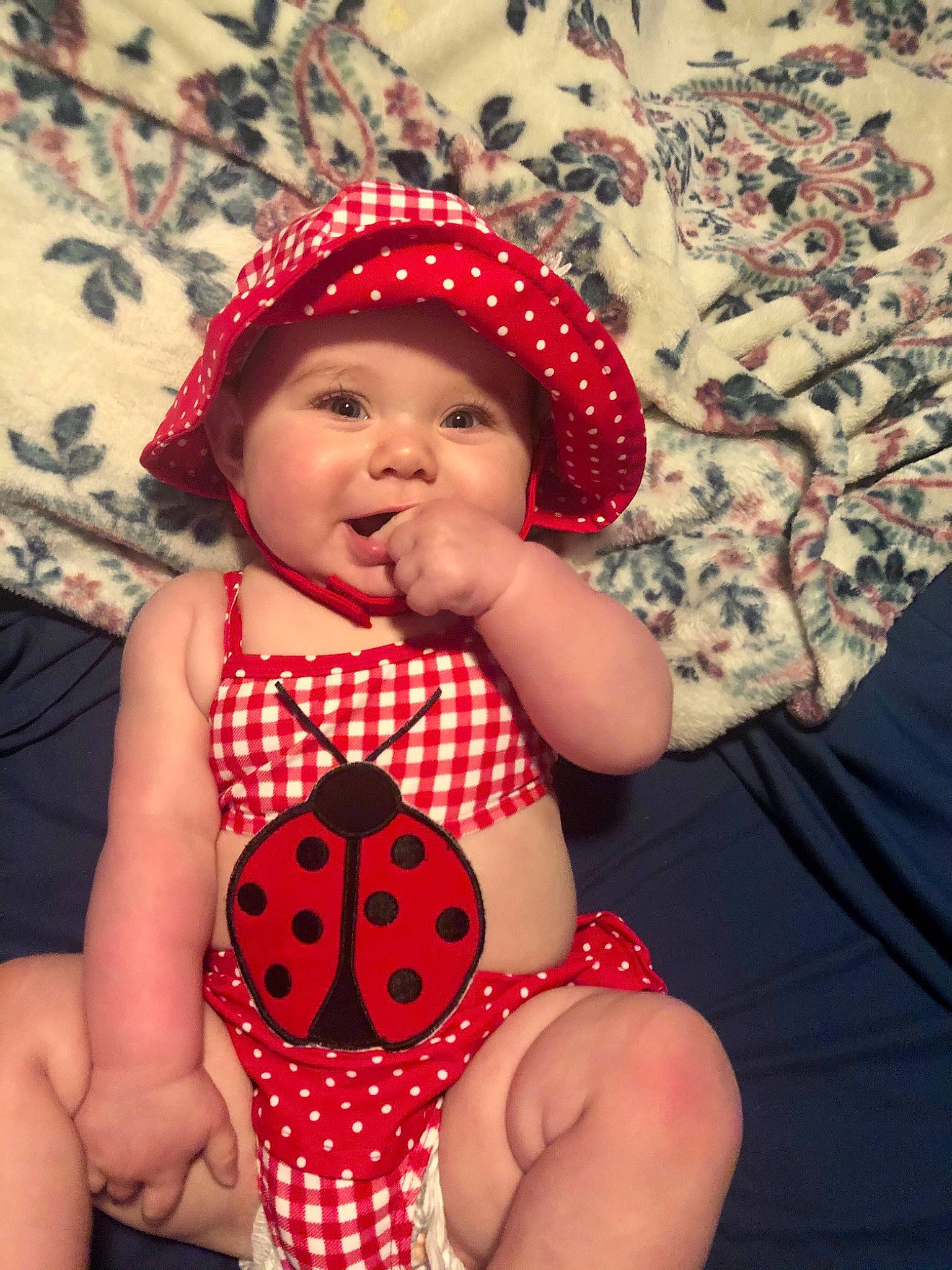 Stephanie joined the competition — help win amazing prizes! baby, baby_toddler_clothing, cap, dress, eye, face, facial_expression, fashion, happy, hat, headwear, human, lip, organ, person, pink, skin, sleeve, sun_hat, textile