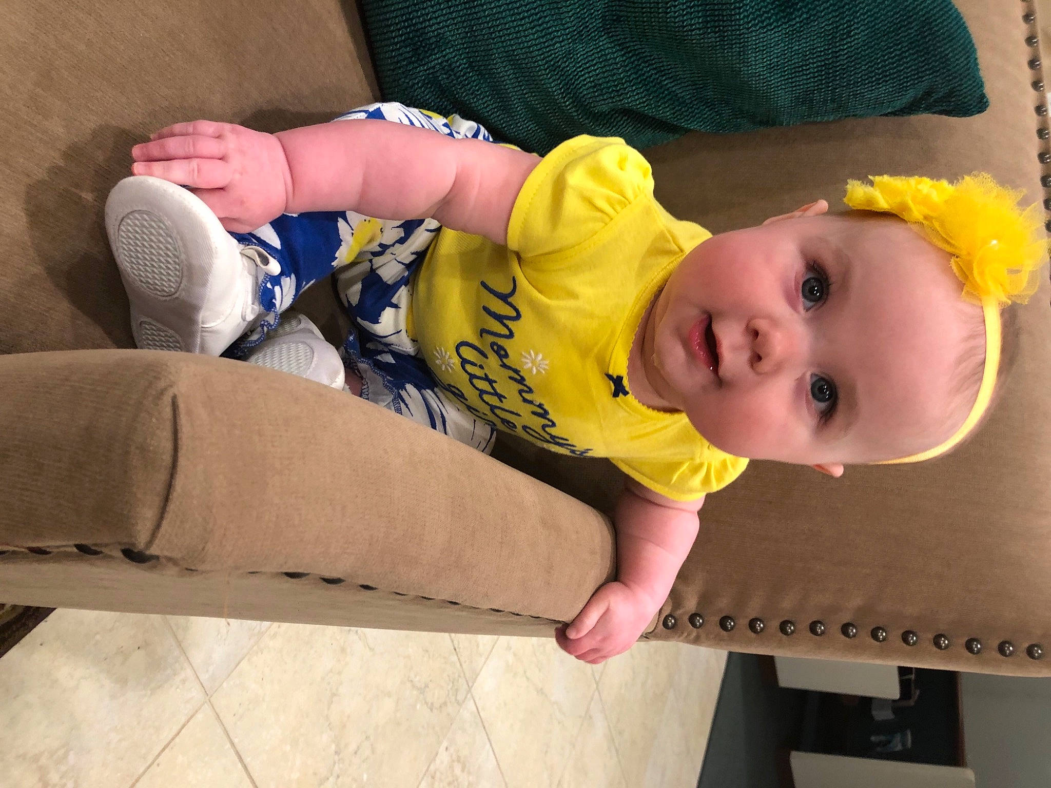 Stephanie joined the competition — help win amazing prizes! baby, baby_toddler_clothing, cheek, child, comfort, floor, flooring, foot, fun, human_leg, knee, nose, person, sitting, skin, smile, sock, thigh, toddler, walking_shoe