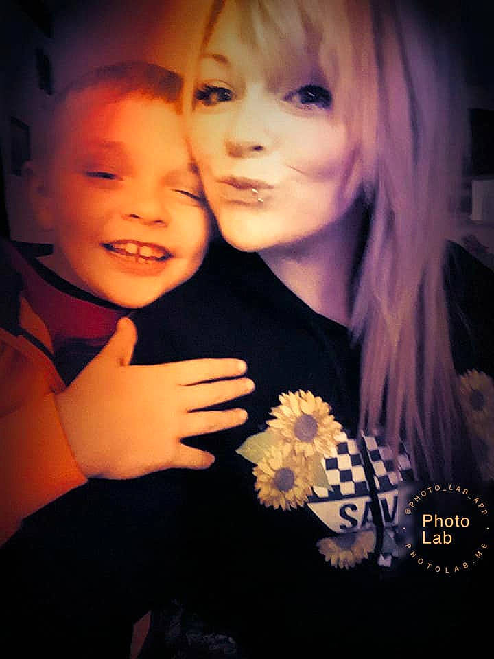 Ben is registered to the contest to win money with this photo: cheek, child, eye, face, flash_photography, flower, friendship, fun, gesture, happy, iris, joy, love, person, photography, plant, portrait, sibling, smile, toddler