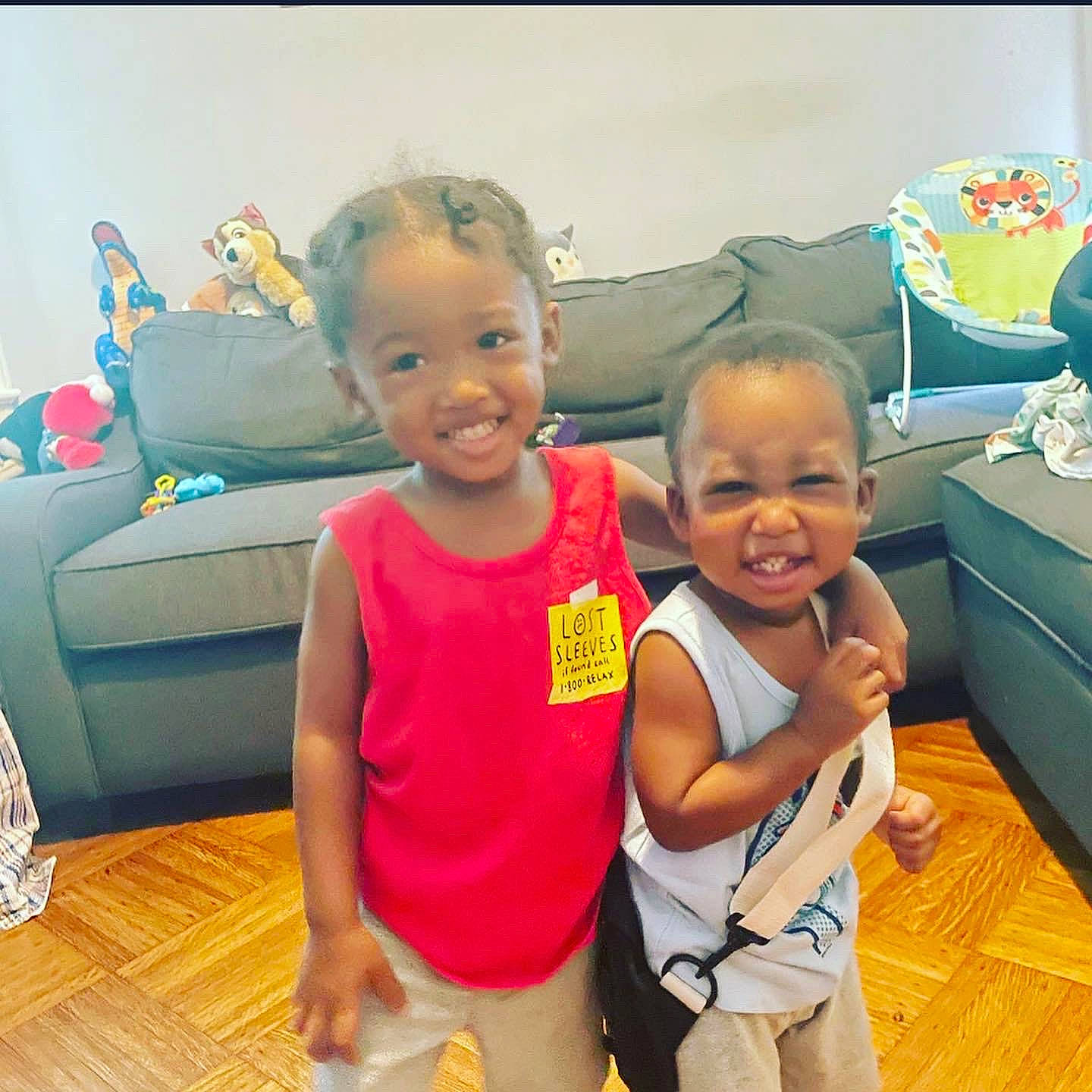 Mason is registered to the contest to win money with this photo: baby, child, event, finger, flooring, fun, gesture, happy, joy, leisure, mouth, person, recreation, room, shorts, skin, smile, t_shirt, thumb, toddler