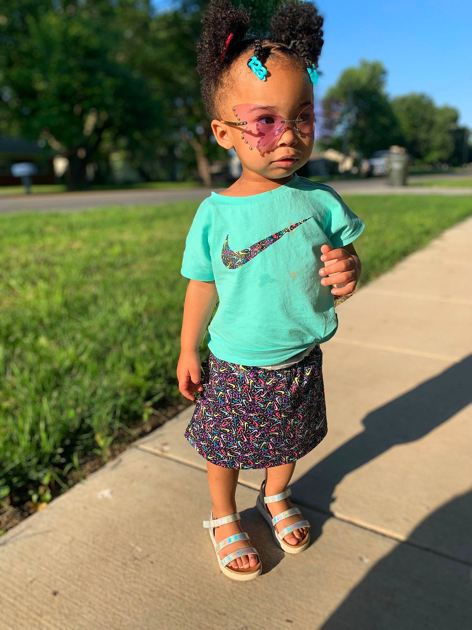 Honesty joined the competition — help win amazing prizes! afro, asphalt, azure, child, cool, eye, eyewear, face, grass, happy, leaf, leisure, people_in_nature, person, plant, shoulder, sky, sleeve, street_fashion, toddler