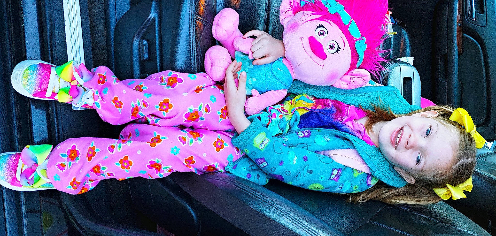 Lyla joined the competition — help win amazing prizes! baby_toddler_clothing, child, comfort, doll, entertainment, event, eye, fun, happy, joy, lap, leisure, magenta, pattern, person, pink, purple, room, sitting, smile