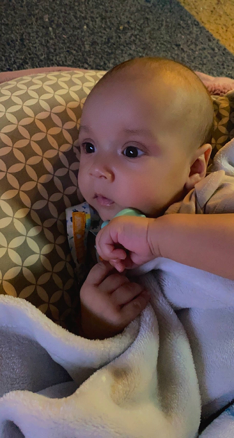 Jeremias is registered to the contest to win money with this photo: baby, baby_products, baby_toddler_clothing, chair, cheek, child, comfort, couch, fun, gesture, iris, linens, lip, nail, nose, pattern, person, sitting, skin, thumb