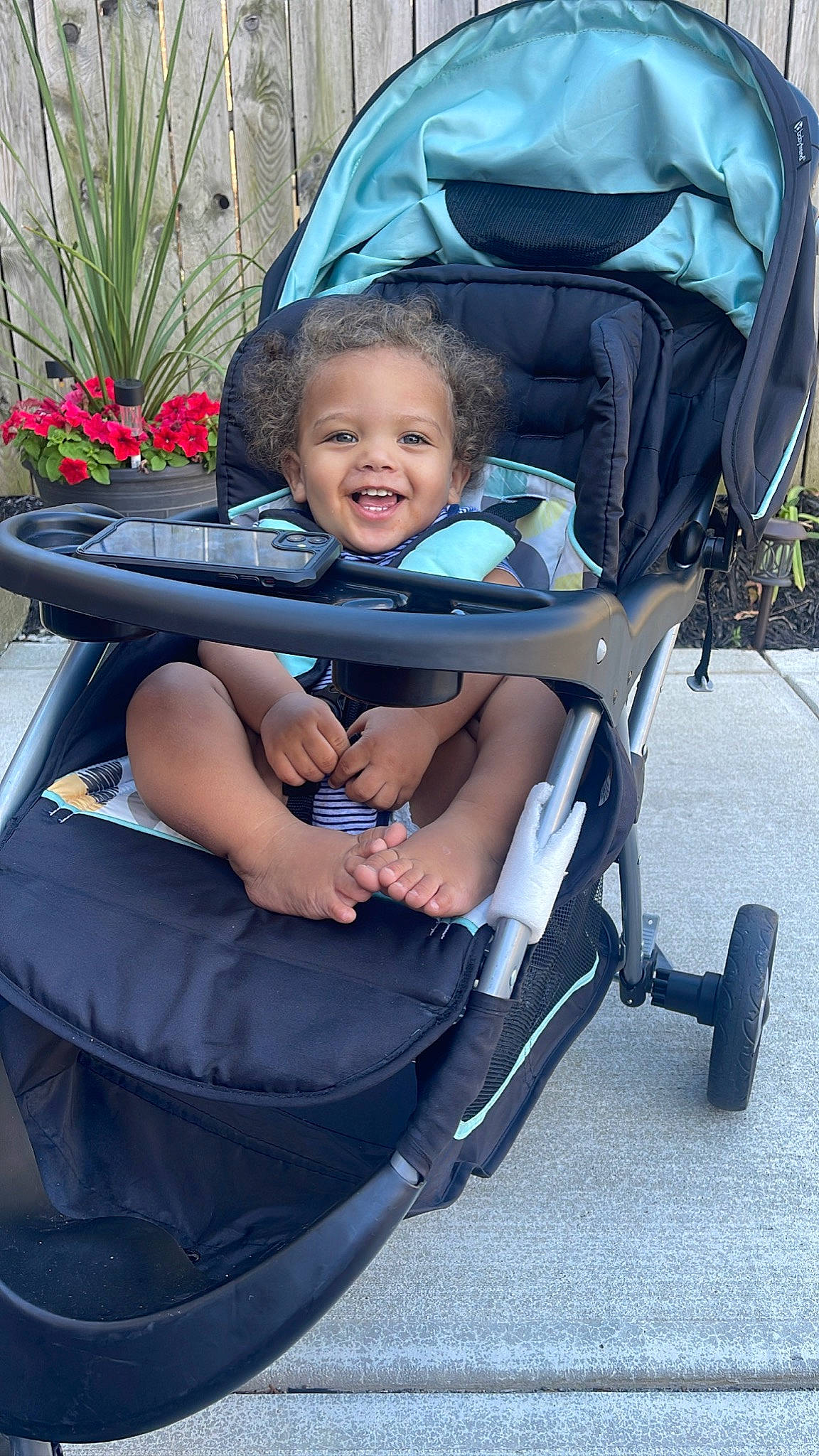 Kamari joined the competition — help win amazing prizes! baby_carriage, baby_products, beauty, chair, child, comfort, electric_blue, face, flower, flowerpot, happy, houseplant, leisure, person, photograph, plant, product, smile, tire, toddler