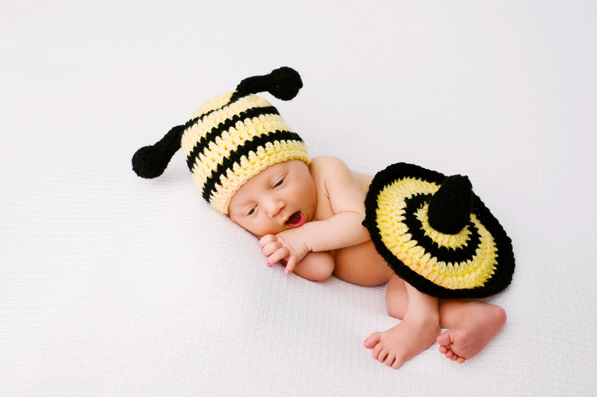Emery is registered to the contest to win money with this photo: baby, baby_products, baby_sleeping, baby_toddler_clothing, cap, child, costume_hat, eyelash, fashion_accessory, finger, font, gesture, happy, headgear, headpiece, headwear, insect, knit_cap, linens, person