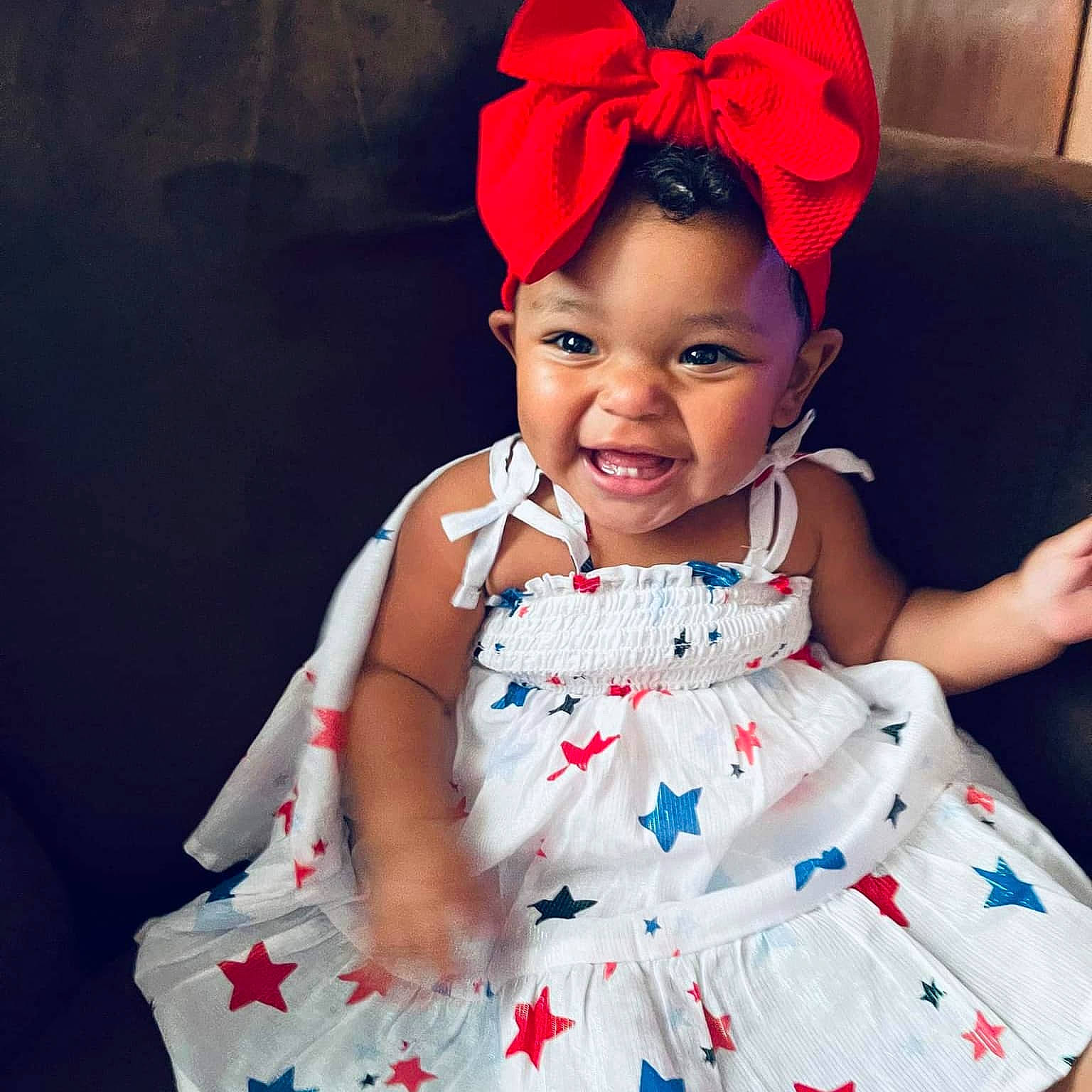 Paisley is registered to the contest to win money with this photo: arm, baby_toddler_clothing, cap, child, costume_hat, day_dress, dress, embellishment, event, fashion_design, fun, happy, neck, pattern, person, pink, skin, sleeve, smile, toddler