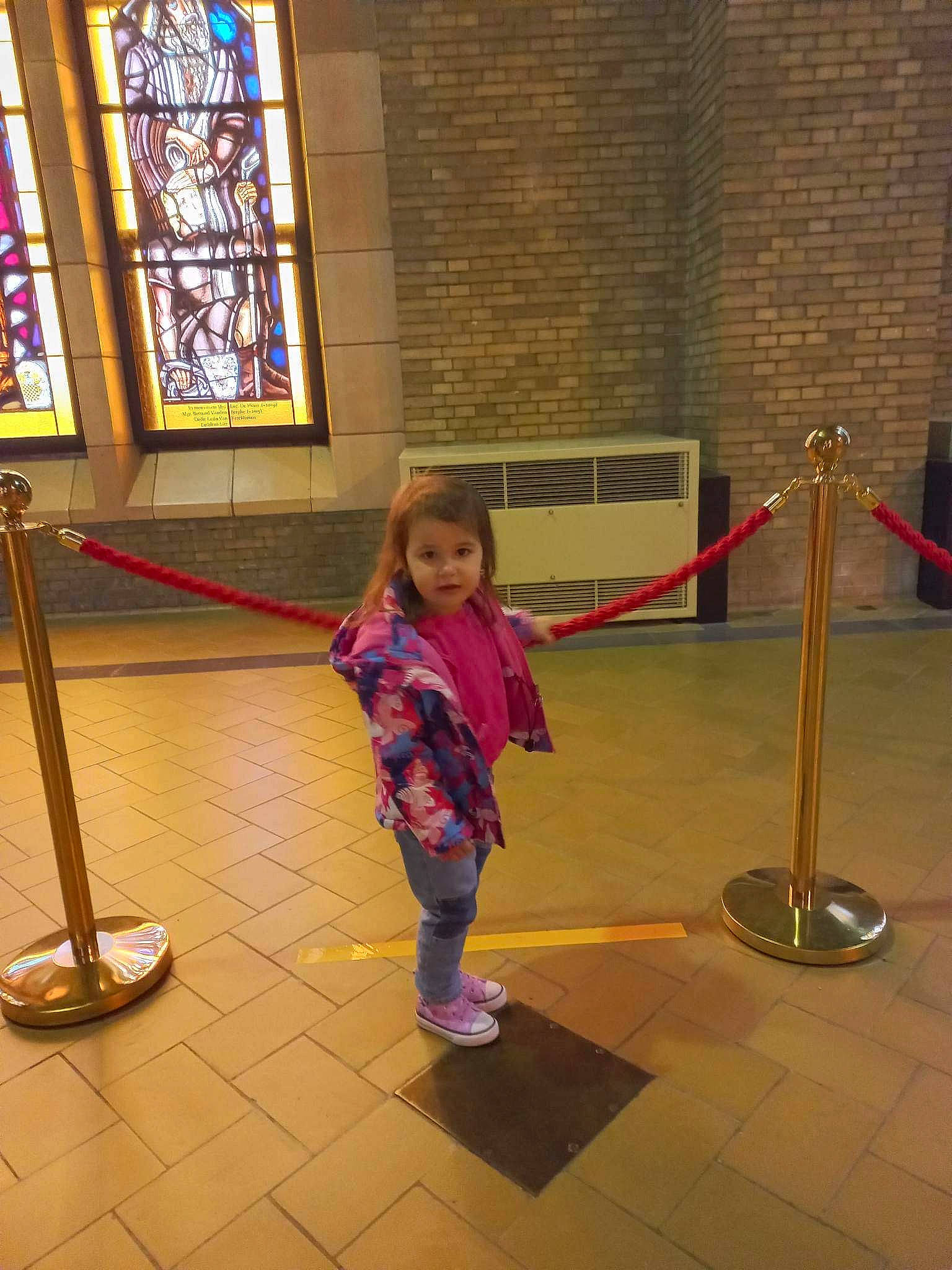 Sofia participe au concours pour gagner de l'argent avec cette photo : building, child, cleanliness, door, event, floor, flooring, fun, glass, leisure, magenta, person, room, stained_glass, standing, tints_and_shades, toddler, varnish, visual_arts, window