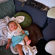 Komang Aïden Bessaye participe au concours pour gagner de l'argent avec cette photo : baby, child, couch, blanket, pillow, cat, tabby_cat, furniture, indoor, resting, sleeping_cat, toddler, soft_furnishings, cozy, relaxation, infant, person, home, comfort, laying_down