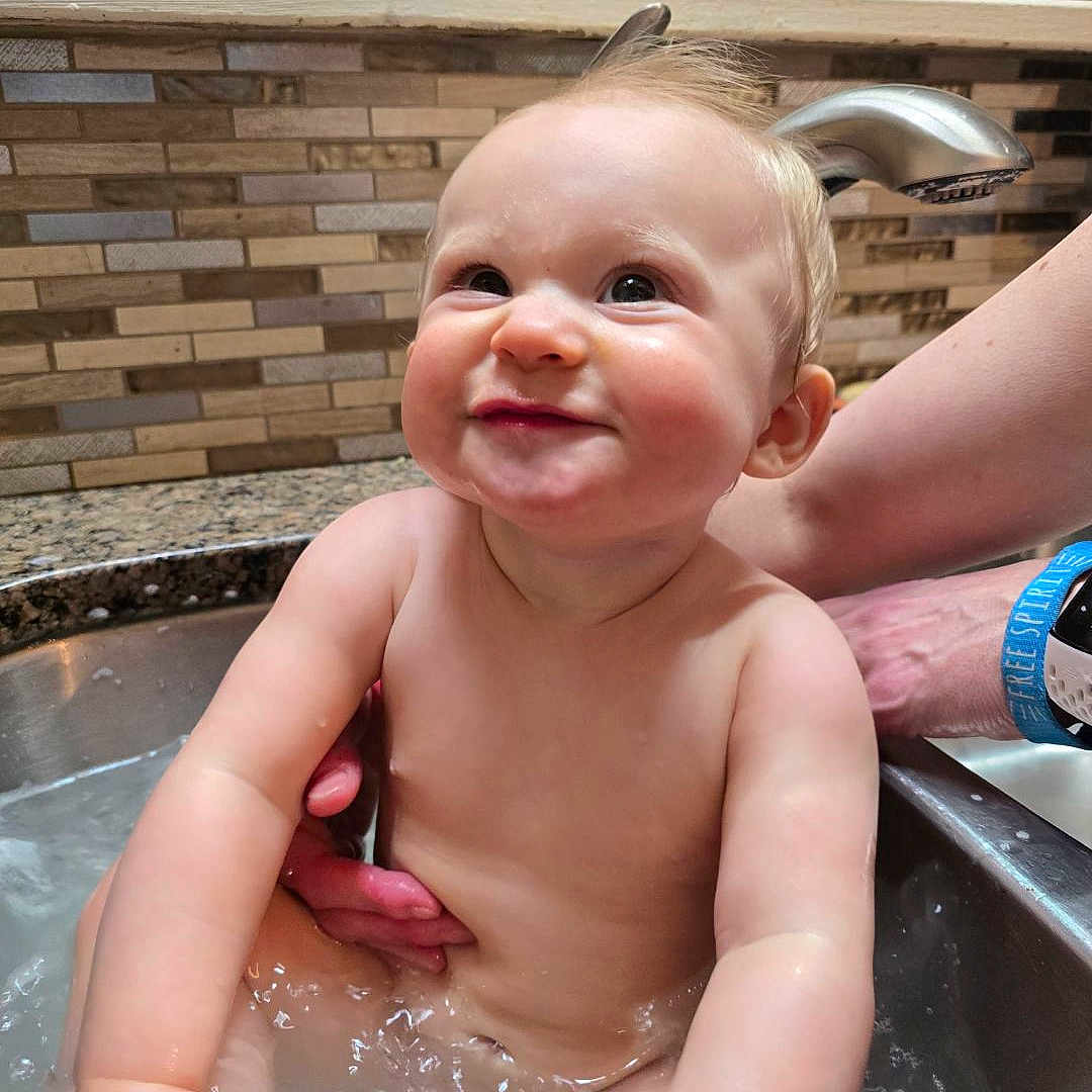 Lydia joined the competition — help win amazing prizes! baby, bathing, bathtub, brush, device, face, happy, head, laughing, person, photography, pool, portrait, smile, summer, swimmingpool, tool, toothbrush, tub, water