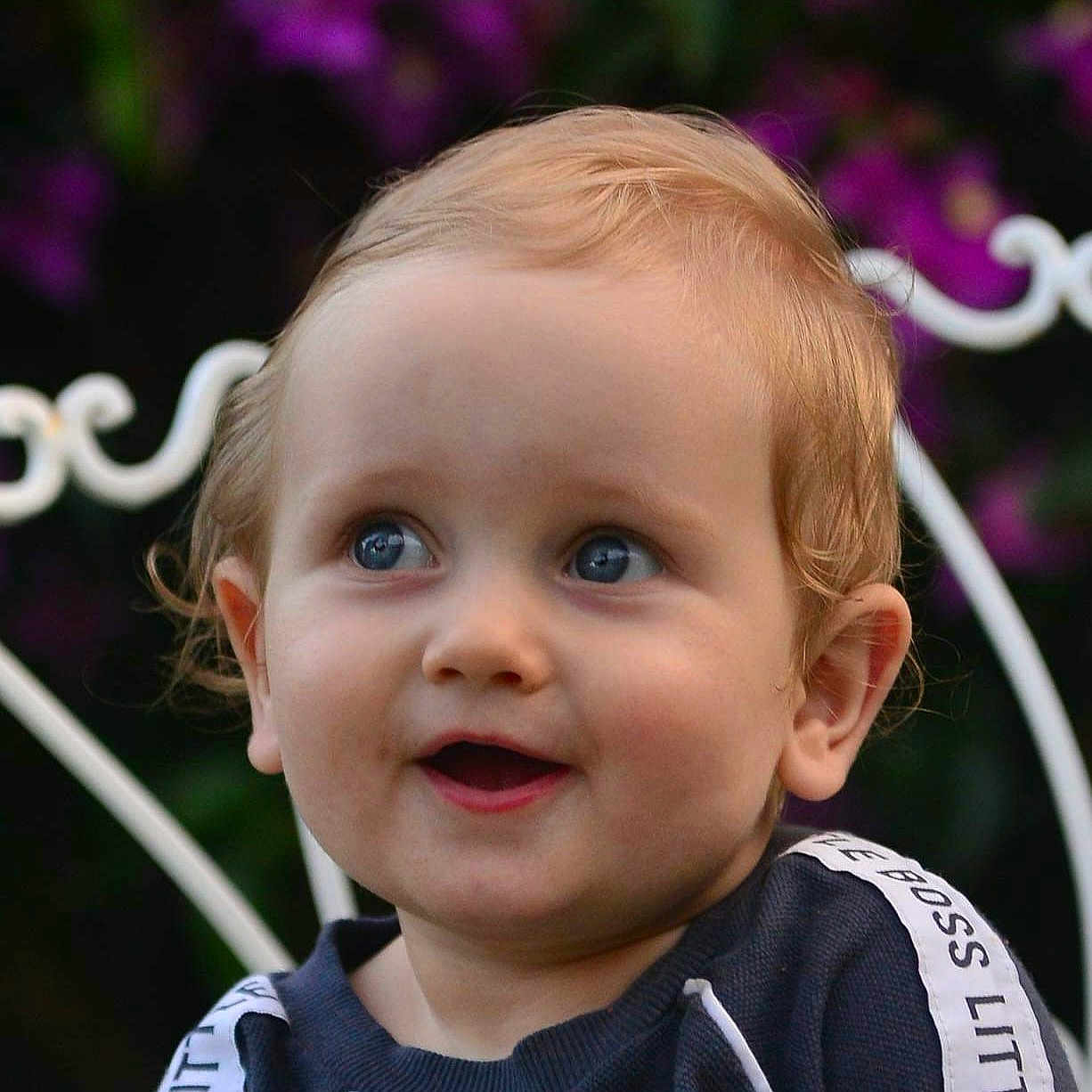 Timur is registered to the contest to win money with this photo: accessories, baby, babylaughing, blonde, bodypart, earring, face, hair, happy, head, jewelry, laughing, mouth, person, photography, plant, portrait, pottedplant, smile, teeth