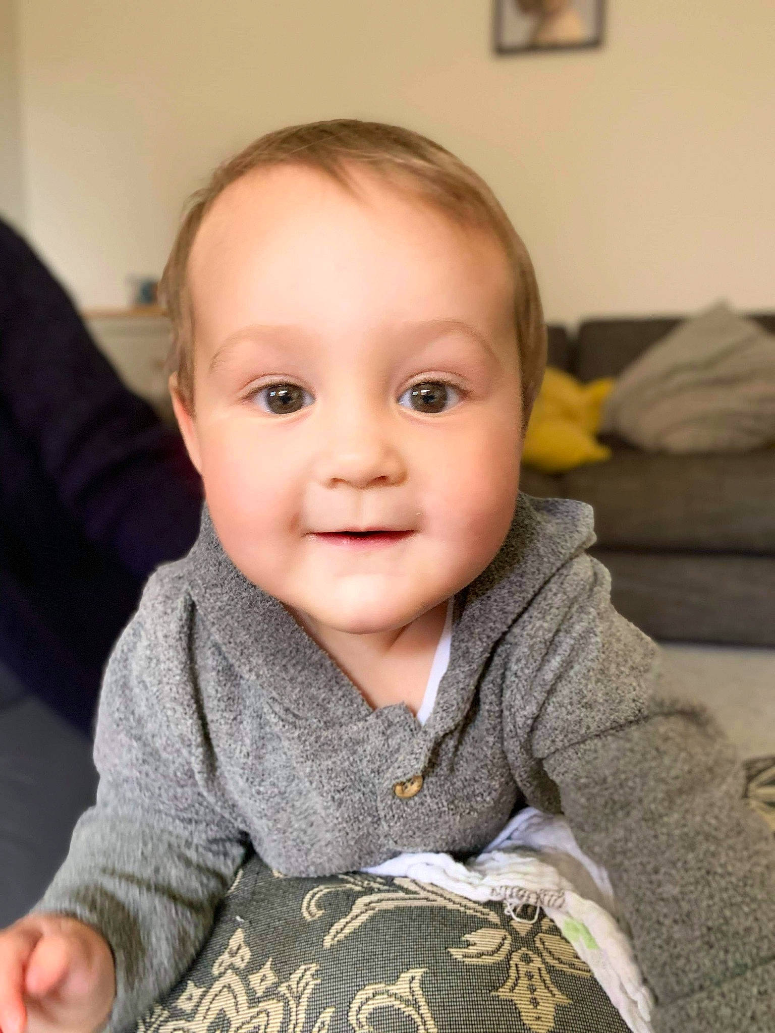 Oliver-james is registered to the contest to win money with this photo: baby, baby_toddler_clothing, beauty, cheek, child, chin, comfort, eyebrow, facial_expression, finger, flooring, iris, mammal, nose, person, product, sitting, skin, sleeve, smile