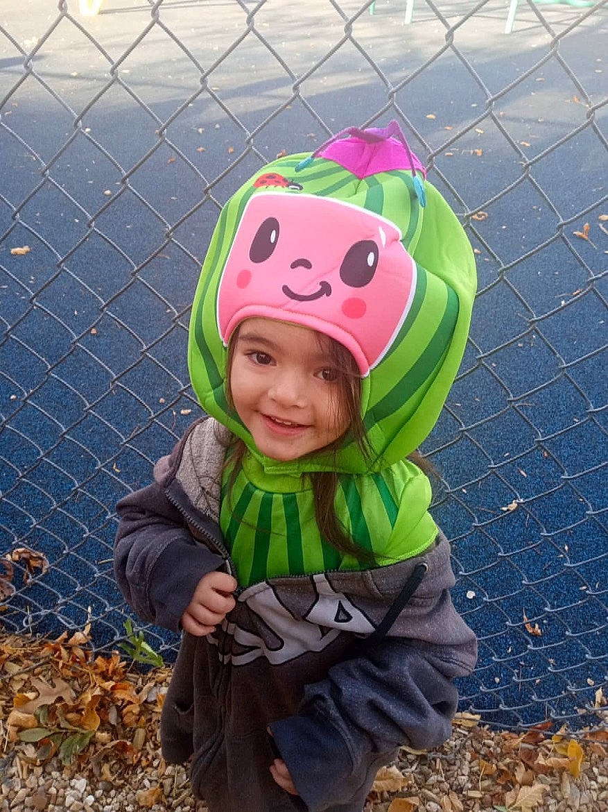 Ganellda is registered to the contest to win money with this photo: baby, baby_toddler_clothing, cap, child, eye, fashion_accessory, fence, fun, grass, happy, head, headwear, joy, leisure, magenta, mesh, pattern, people_in_nature, person, personal_protective_equipment