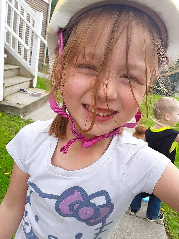 Skyla is registered to the contest to win money with this photo: cheek, child, clothing, cool, ear, eyelash, fun, gesture, grass, hairstyle, happy, jaw, joy, leisure, lip, mouth, neck, person, pink, smile