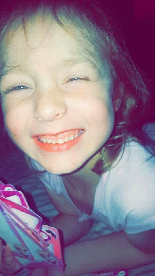 Skyla is registered to the contest to win money with this photo: azure, cheek, chin, ear, eyebrow, eyelash, flash_photography, forehead, happy, iris, jaw, joy, lip, mouth, nose, organ, person, pink, purple, skin