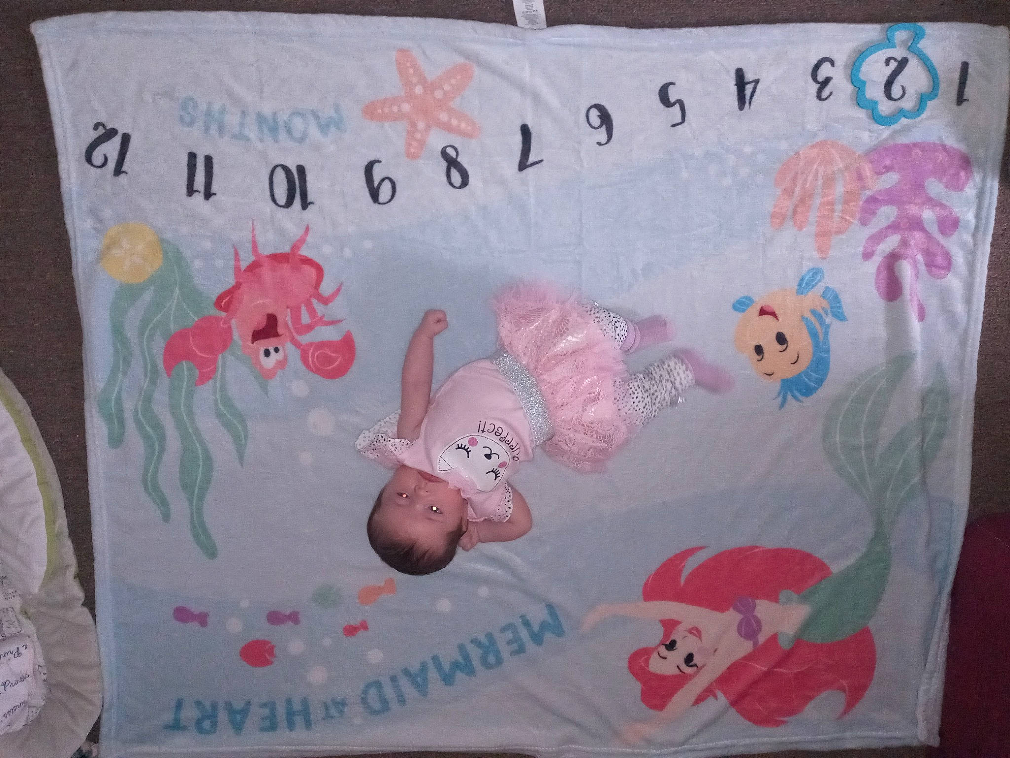 Audree is registered to the contest to win money with this photo: art, bedding, child, creative_arts, drawing, event, font, illustration, linens, magenta, mammal, paper, pattern, person, pink, product, room, sleeve, vertebrate, visual_arts