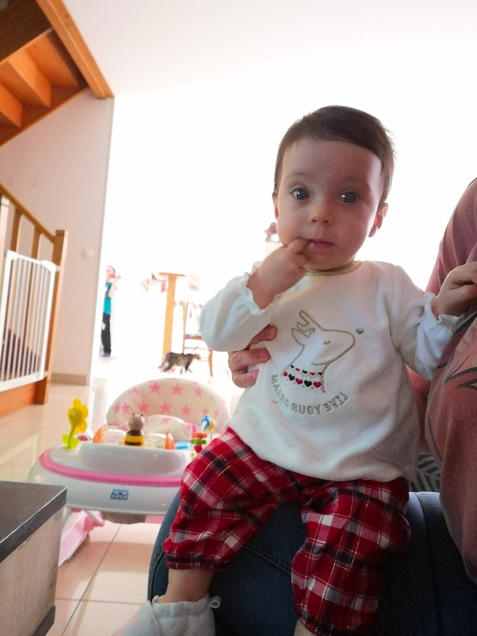 Noeline participe au concours pour gagner de l'argent avec cette photo : baby, baby_toddler_clothing, child, flooring, fun, happy, knee, mammal, pattern, person, plaid, play, product, shorts, sitting, sock, standing, t_shirt, tartan, thigh