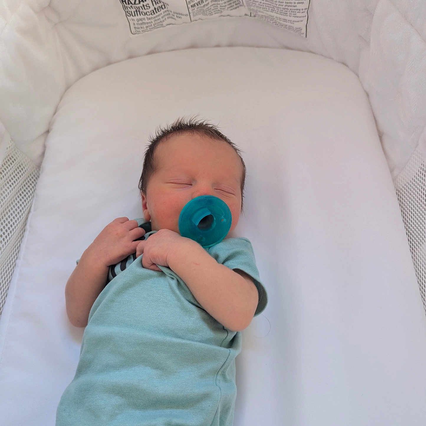 Liam joined the competition — help win amazing prizes! baby, bassinet, care, child, cozy, cute, health, indoors, infant, newborn, onesie, pacifier, peaceful, portrait, resting, sleeping, small, soft, warning_label, white