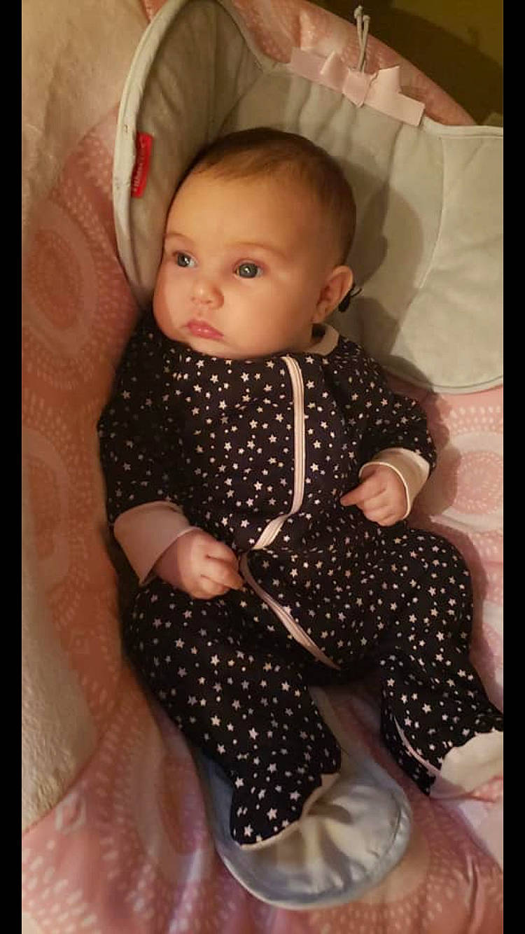 Kenzlee is registered to the contest to win money with this photo: baby, baby_products, baby_toddler_clothing, cheek, child, design, eye, head, iris, pattern, person, polka_dot, product, skin, smile, toddler