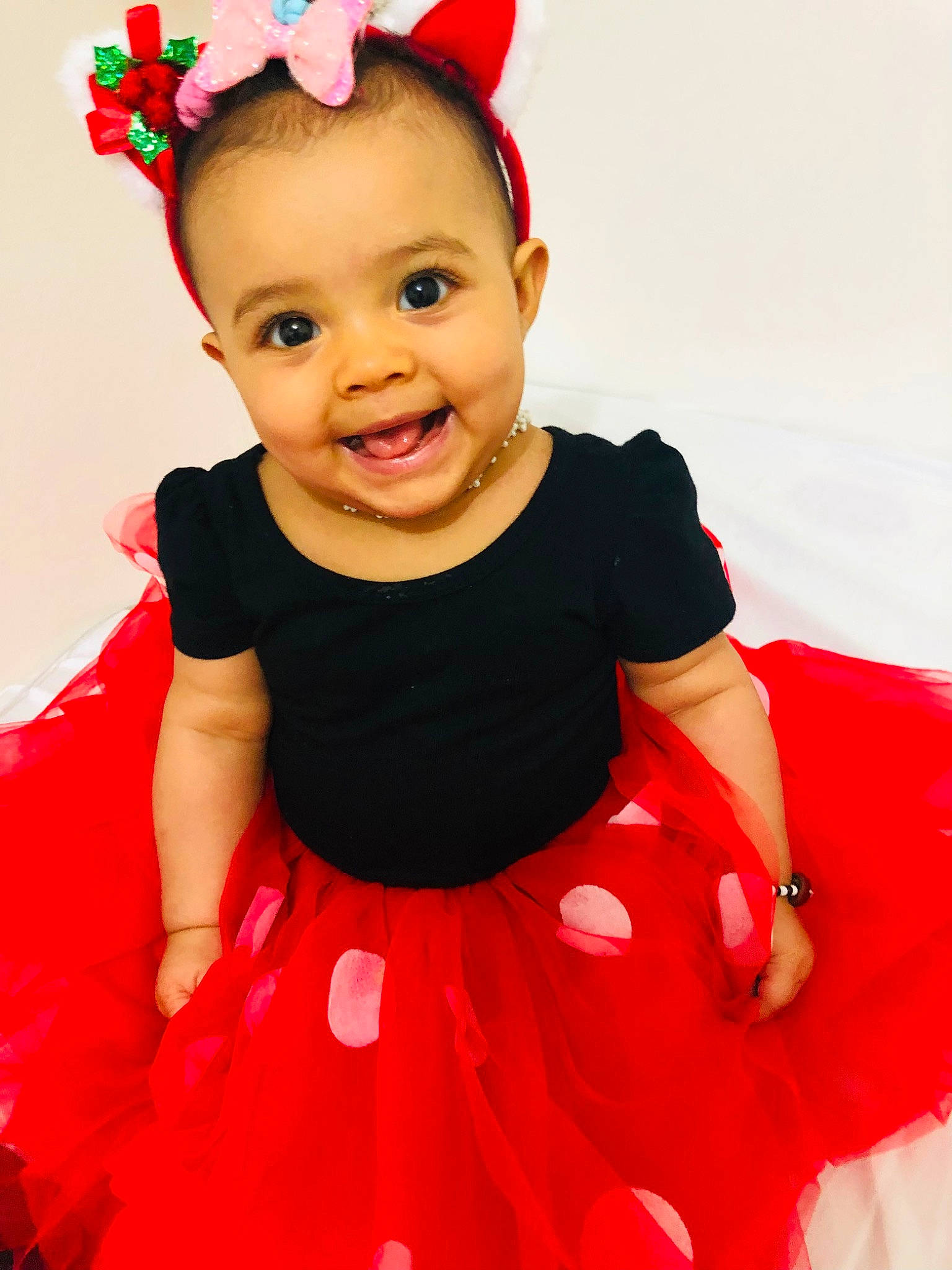 Horeb participe au concours pour gagner de l'argent avec cette photo : baby, baby_toddler_clothing, cheek, child, clothing, dress, face, facial_expression, happy, joy, magenta, person, pink, product, red, skin, sleeve, smile, standing, textile