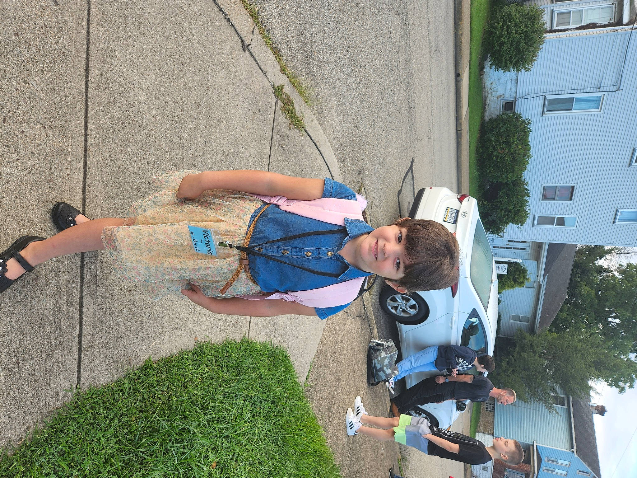 Victoria joined the competition — help win amazing prizes! asphalt, child, concrete, electric_blue, fun, grass, human_leg, joy, leisure, pedestrian, person, plant, recreation, road, shadow, sidewalk, smile, toddler, tree, vacation